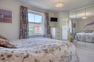 Bedroom One- click for photo gallery